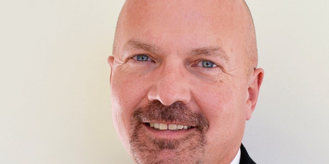 In this photo provided by Mercy Medical Center is Dr. Douglas Butzier. The Dubuque, Iowa, doctor who was running as a Libertarian candidate for U.S. Senate, died in a plane crash Monday near Dubuque Regional Airport, authorities said Tuesday, Oct. 14, 2014.