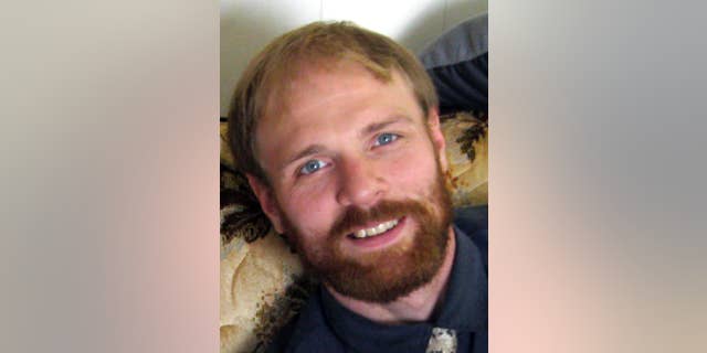 In this 2014 photo provided by Gary Lentzkow is his son Matthew Lentzkow in La Porte City, Iowa. Lentzkow, 36, of Newton, died on Nov. 1 in a traffic accident on Interstate 80 after managing to escape from an Iowa State Patrol car while handcuffed. (AP Photo/Gary Lentzkow)