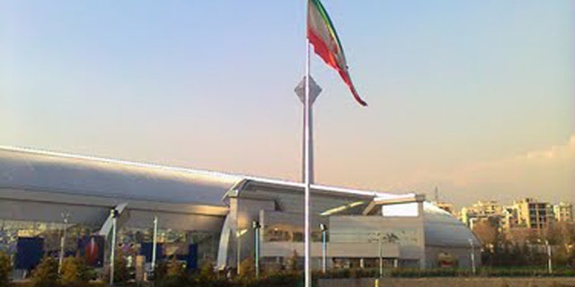 New flagpoles in Iran are sparking fears that the Islamic regime is using them to hide satellite jamming technology that can block Internet, TV and phone communication.