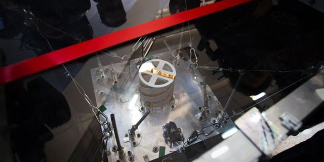 Feb. 29, 2012: A qualification model of the Navid-1 satellite is displayed for journalists during a visit to the Iranian Space Agency (ISA) in Mahdasht, about 60 km west of Tehran.
