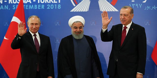 Russia's Vladimir Putin, Iran's Hassan Rouhani and Turkish President Recep Tayyip Erdogan