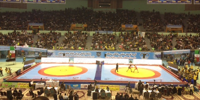 Feb. 21: A sell-out crowd in Tehran's Azadi Sport Complex watches the Freestyle World Cup.