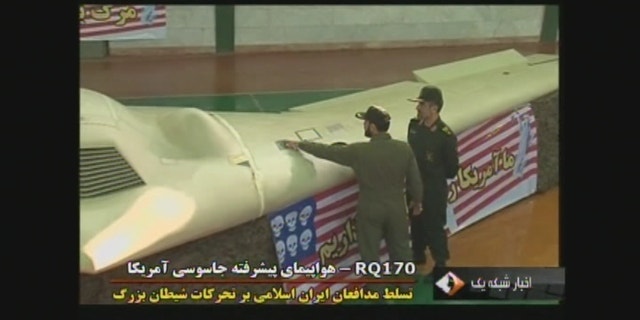 Dec. 8, 2011: Images aired by Iranian state television show the secret U.S. drone that went down last week in eastern Iran.