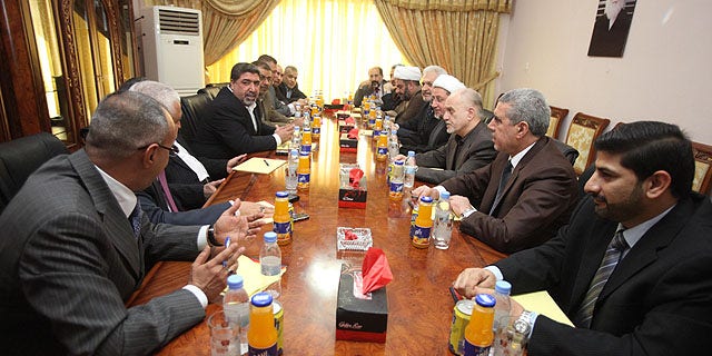 Oct. 1, 2010: Representatives of Shiite cleric Muqtada al-Sadr and Iraqi Prime Minister Nouri  al-Maliki's political parties meet in Baghdad, Iraq.