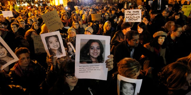 Nov. 14, 2012: Protestors outside Leinster House in Dublin against the death in October of Savita Halappanavar, pictured, a dentist aged 31, who was 17 weeks pregnant, after suffering a miscarriage and septicaemia.