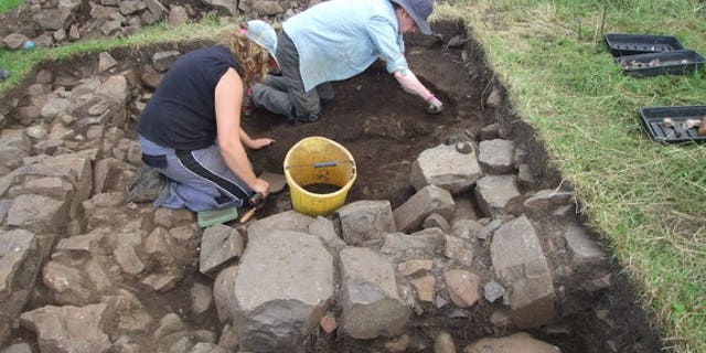 Archaeologists excavated a stone structure near Dunluce Castle along the coast of Northern Ireland. Experts already knew about a town that flourished in the 1600s, but they were unaware of the earlier settlement, which dates back to the late 14