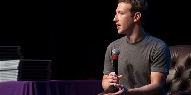 In a Sept. 18, 2014, file photo, Facebook CEO Mark Zuckerberg speaks to students during a special assembly at Sequoia High School in Redwood City, Calif.