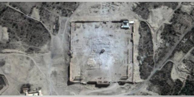 This Monday, Aug. 31, 2015 satellite image provided by UNITAR-UNOSAT shows damage to the main building of the ancient Temple of Bel in the Palmyra, Syria. The main building has been destroyed, a United Nations agency said. The image was taken a day after a massive explosion was set off near the 2,000-year-old temple in the city occupied by Islamic State militants. (UrtheCast, UNITAR-UNOSAT via AP)
