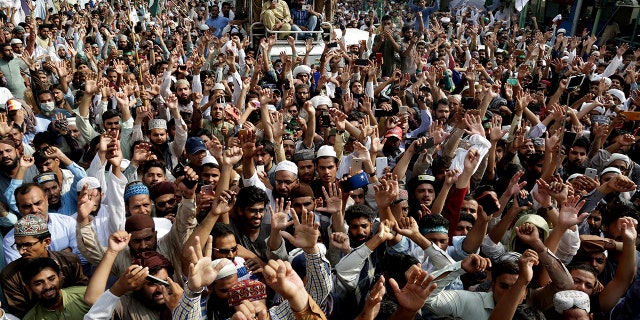 Supporters of Pakistani religious group shout slogans during a march towards Islamabad Wednesday in Lahore, Pakistan. Thousands of Islamists in Pakistan launched a march toward the capital to protest a far-right Dutch lawmaker’s plans to hold a Prophet Muhammad cartoon contest later this year. Physical depictions of the prophet are forbidden in Islam, and deeply offensive to Muslims.