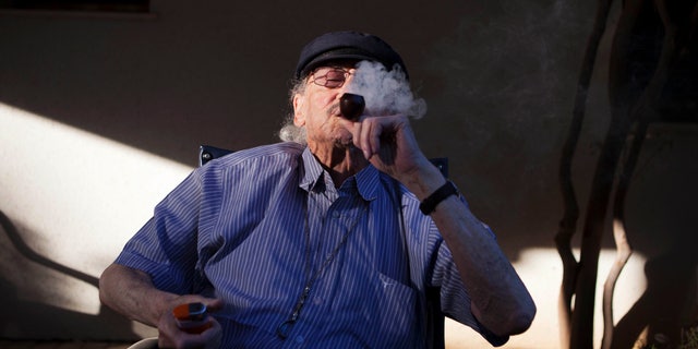 Oct. 30, 2012: Moshe Rute, 80, smokes medical cannabis at the old age nursery home in kibbutz Naan next to the city of Rehovot, Israel. Marijuana is illegal in Israel but medical use has been permitted since the early nineties for cancer patients and those with pain-related illnesses such as Parkinson's, Multiple Sclerosis, and even post-traumatic stress disorder.
