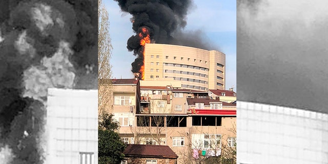 A fire engulfing a facade of the Taksim Ilk Yardim hospital in the Gaziosmanpasa district in Istanbul, Thursday, April 5, 2018.