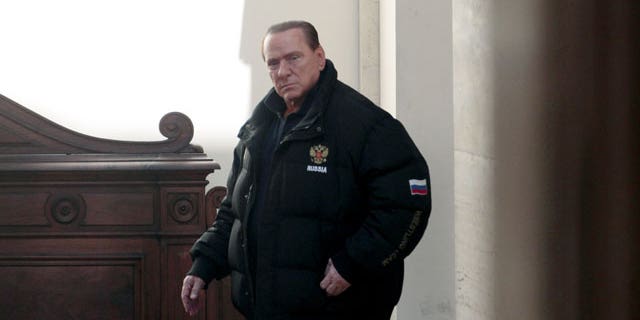 Feb. 25, 2012: Former Italian premier Silvio Berlusconi leaves his residence Palazzo Grazioli in Rome.