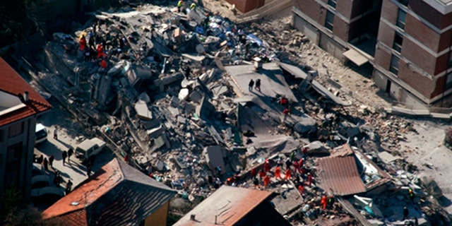 April 6, 2009: An aerial photo provided by the Italian Police shows the debris of a collapsed building in an area near L'Aquila, central Italy, after a powerful earthquake shook central Italy.