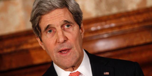 U.S. Secretary of State John Kerry talks to journalists during a briefing with Italian Foreign Minister Federica Mogherini, prior to a dinner at the U.S. Ambassador's Villa Taverna residence in Rome, Thursday, March 6, 2014. (AP Photo/Riccardo De Luca)