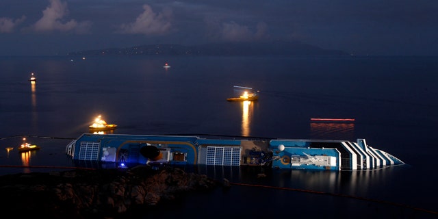 Jan. 23: The grounded cruise ship Costa Concordia lies on its side off the Tuscan island of Giglio, Italy.