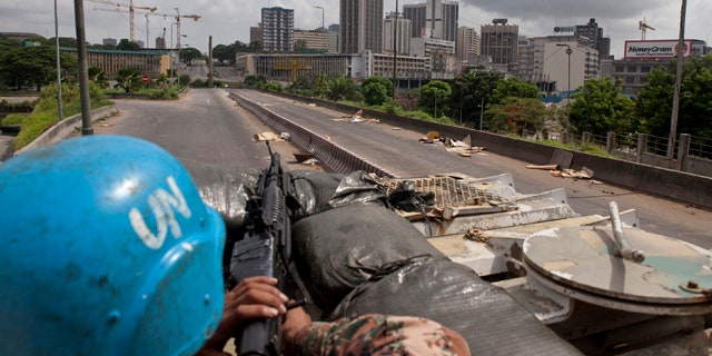 April 8, 2011: UN peacekeepers patrol in the streets of the city of Abidjan, Ivory Coast.