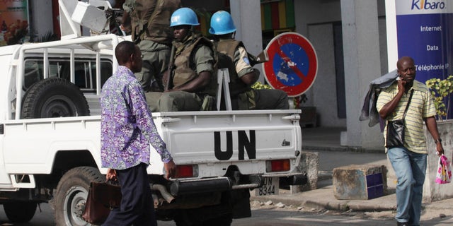 UN forces patrol on a street of, Ivory Coast, Abidjan, Wednesday, Dec. 22, 2010. The U.N. chief has warned that Ivory Coast faces "a real risk" of return to civil war, and that U.N. peacekeepers will face a critical situation in the coming days unless Laurent Gbagbo removes a blockade around his opponent's headquarters.
