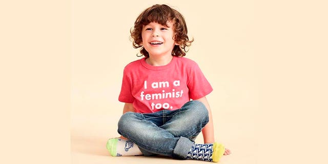 J.Crew posted a photo on Friday that featured a young male model in the controversial pink, feminist-focused T-shirt.