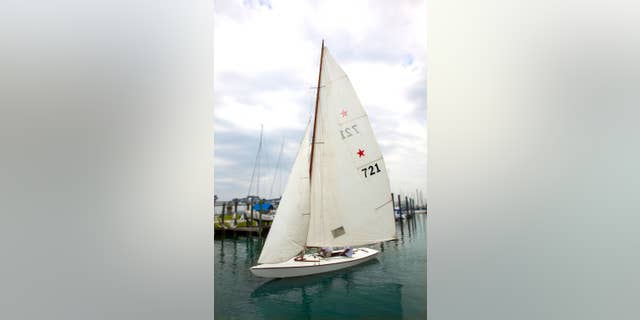 This July 29, 2014 handout photo provided by Heritage Auctions shows John F. Kennedy’s Star Class Sailboat, Flash II, which he owned and raced with older brother Joseph P. Kennedy in the Nantucket Sound Star Fleet between 1934 and 1940. It will be offered for auction on Monday, May 18, 2015, in Dallas, by Heritage Auctions. ( Don Hoffman/Heritage Auctions via AP)