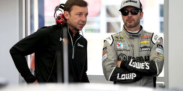 LAS VEGAS, NV - MARCH 03: (L-R) Crew Chief Chad Knous talks with Jimmie Johnson, driver of the #48 Kobalt Chevrolet, in the garage during Testing at Las Vegas Motor Speedway on March 3, 2016 in Las Vegas, Nevada. (Photo by Sean Gardner/NASCAR via Getty Images)