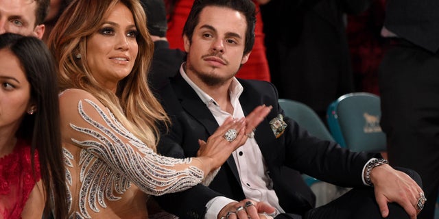 LAS VEGAS, NV - MAY 17: Recording artist Jennifer Lopez (L) and actor Casper Smart attend the 2015 Billboard Music Awards at MGM Grand Garden Arena on May 17, 2015 in Las Vegas, Nevada. (Photo by Larry Busacca/BMA2015/Getty Images for dcp)