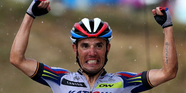 PLATEAU DE BEILLE, FRANCE - JULY 16: Joaquin Rodriguez Oliver of Spain and Team Katusha celebrates as he crosses the finish line to win stage twelve of the 2015 Tour de France, a 195 km stage between Lannemezan and Plateau de Beille, on July 16, 2015 in Plateau de Beille, France. (Photo by Doug Pensinger/Getty Images)