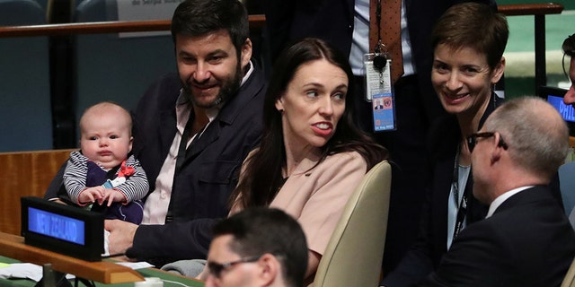 New Zealand Prime Minister Jacinda Ardern sits with her baby Neve before speaking at the Nelson Mandela Peace Summit during the 73rd United Nations General Assembly in New York, U.S., September 24, 2018.