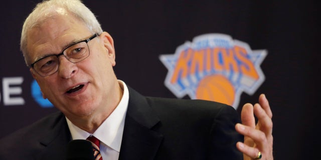 Phil Jackson, the new president of the New York Knicks, answers questions during a news conference, Tuesday, March 18, 2014 in New York. Jackson, who won two NBA titles as a player with the Knicks, also won 11 championships while coaching the Chicago Bulls and the Los Angeles Lakers. (AP Photo/Mark Lennihan)