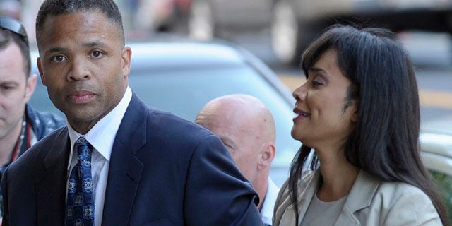 Aug. 14, 2013: Former Illinois Rep. Jesse Jackson Jr. and his wife, Sandra, arrive at federal court in Washington.