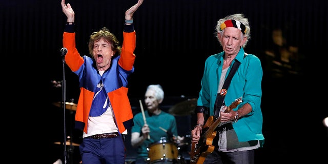 Mick Jagger (left) and Keith Richards (right) of The Rolling Stones are seen in this file 2016 photo performing during Desert Trip music festival at Empire Polo Club in Indio, California.