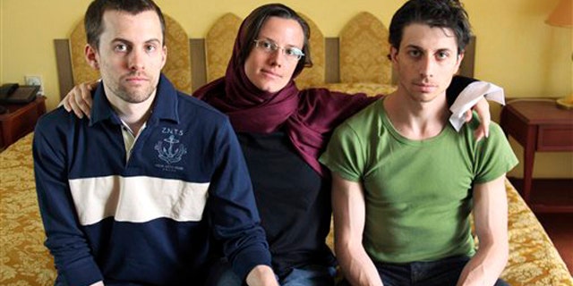 In this May 20, 2010 file photo, American hikers Shane Bauer, left, Sarah Shourd, center, and Josh Fattal, sit at the Esteghlal Hotel in Tehran, Iran.