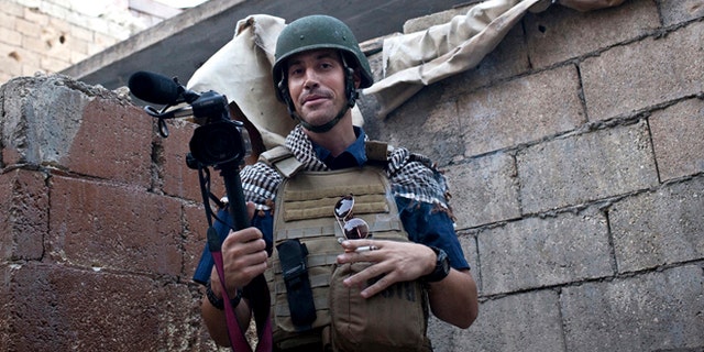 This November 2012 photo, posted on the website freejamesfoley.org, shows American journalist James Foley while covering the civil war in Aleppo, Syria.