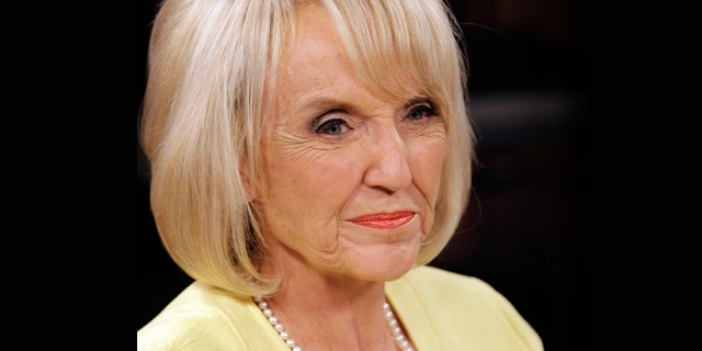 Sept. 1, 2010: Republican Arizona Gov. Jan Brewer waits for a TV debate to begin.