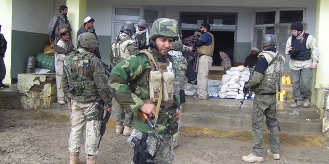 Janis Shinwary (foreground) was granted U.S. visa status earlier this month for his assistance to military forces in Afghanistan -- but now his status is under review and he has been left a potential target of Taliban militants.