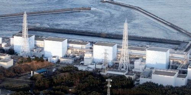 March 11: Fukushima Daiichi power plant's Unit 1 is seen in Okumamachi, Fukushima prefecture, Japan. The nuclear power plant affected by a massive earthquake is facing a possible meltdown, an official with Japan's nuclear safety commission said Saturday. (AP/The Yomiuri Shimbun)