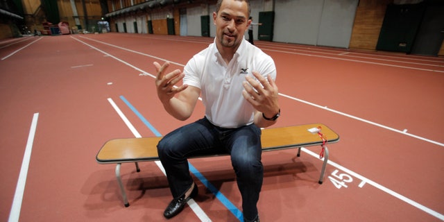 June 12, 2012: In this photo, Japan's hammer thrower for London Olympics, Koji Murofushi speaks during an interview with the Associated Press in Tokyo.
