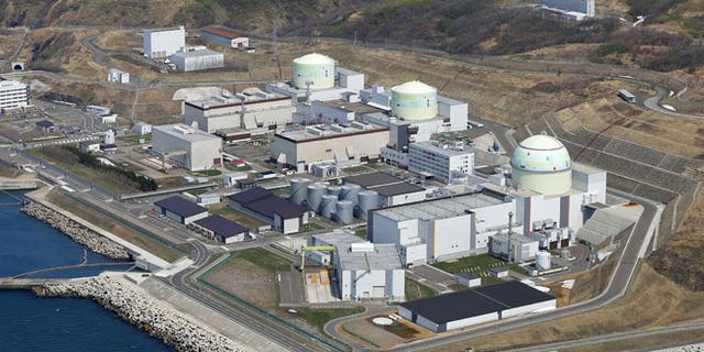 In this aerial photo taken April 22, 2012, three reactors, from left, No. 1, No. 2 and No. 3, are seen at the Tomari Nuclear Power Plant, operated by Hokkaido Electric Power Co., in Tomari in Japan's northernmost main island of Hokkaido.