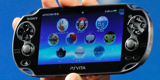 In this Sept. 14, 2011 file photo, Sony Computer Entertainment's PlayStation Vita is shown during a press conference in Tokyo.