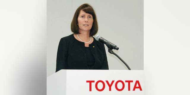 FILE - In this July 17, 2015 file photo, Toyota Motor Corp.'s head of public relations Julie Hamp speaks during a press conference in Toyota, central Japan. Toyota said Wednesday, July 1, 2015, the US executive arrested in Japan on suspicion of drug law violations has resigned. (Tsutomu Agechi/Kyodo News via AP, File) JAPAN OUT, CREDIT MANDATORY