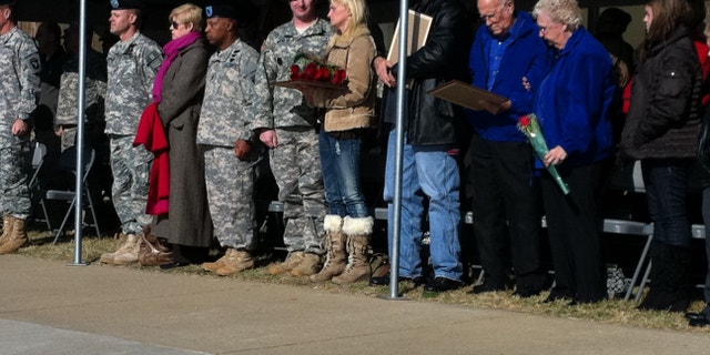 Nov. 10, 2011: Family of Sergeant First Class Barry Jarvis, killed in combat, recieves Silver Star at Fort Campbell, Ky.