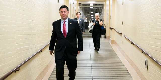 WASHINGTON, DC - JULY 9: U.S. Rep. Jason Chaffetz (R-UT) makes his way to a House GOP caucus meeting, on Capitol Hill, July 9, 2013 in Washington, DC. The Republican leadership discussed the immigration bill and the Obama administration's decision to delay a portion of the Affordable Care Act, which will extend the deadline for employer mandated health care to 2015. At right, Trey Radel (R-FL) and House Majority Leader Eric Cantor (R-VA) look on. (Photo by Drew Angerer/Getty Images)