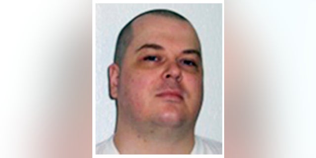 FILE - This combination of undated file photos provided by the Arkansas Department of Correction shows death-row inmates Jason F. McGehee, left, and Kenneth Williams. Both men are scheduled for execution on April 27, 2017. (Arkansas Department of Correction via AP)