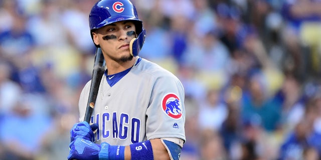 LOS ANGELES, CA - OCTOBER 20: Javier Baez #9 of the Chicago Cubs reacts after striking out in the first inning in game five of the National League Division Series at Dodger Stadium on October 20, 2016 in Los Angeles, California. (Photo by Harry How/Getty Images)