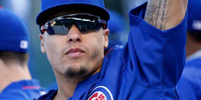 Chicago Cubs' Javier Baez works out during practice before baseball's National League Championship Series against the Los Angeles Dodgers, Friday, Oct. 14, 2016, in Chicago. The Cubs host Game 1 of the series against the Dodgers on Saturday. (AP Photo/Nam Y. Huh)