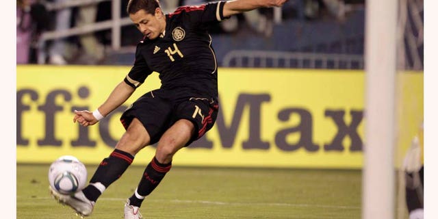 Mexico's Javier Hernandez misses a shot on goal at close range against Venezuela in the first half during an international friendly soccer match Tuesday, March 29, 2011, in San Diego. (AP Photo/Gregory Bull)