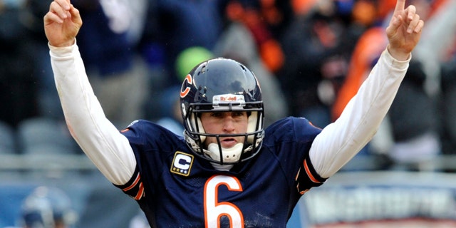 Chicago Bears quarterback Jay Cutler (6) reacts to a touchdown against the Seattle Seahawks during the second half an NFL divisional playoff football game Sunday, Jan. 16, 2011, in Chicago. (AP Photo/Jim Prisching)