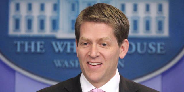 White House Press Secretary Jay Carney briefs reporters at the White House in Washington, Friday, April 1, 2011. (AP Photo/Charles Dharapak)