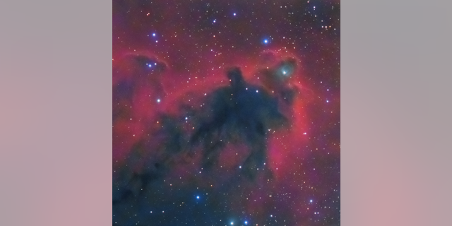 The Boogie Man Nebula looms in deep space.
