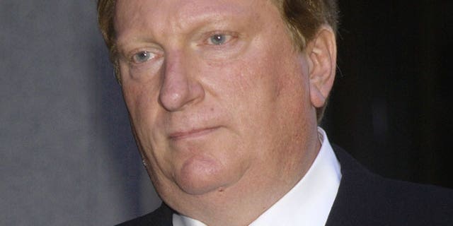 Nov. 2002: Jeffrey Jones appears at a news conference following his appearance in court on child pornography charges.