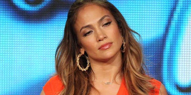 PASADENA, CA - JANUARY 08: Judge Jennifer Lopez speaks onstage during the 'American Idol' panel during the FOX Broadcasting Company portion of the 2012 Winter TCA Tour at The Langham Huntington Hotel and Spa on January 8, 2012 in Pasadena, California. (Photo by Frederick M. Brown/Getty Images)